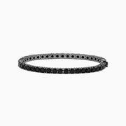 The Mens Silver Rhodium Plated Black Spinel Tennis Bracelet features a row of round black spinels in a sleek silver band, shown on a white background.