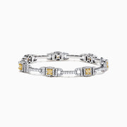 An elegant 18K two tone gold bracelet featuring rectangular yellow gemstones and white diamonds (4.37 TCW), with each gem framed by diamonds and joined by diamond-studded links in an intricate design.