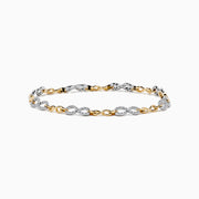 The Duo 14K Two Tone Gold Diamond Infinity Tennis Bracelet 0.53 TCW features alternating twisted gold and silver links, each set with sparkling diamonds, displayed on a plain white background.