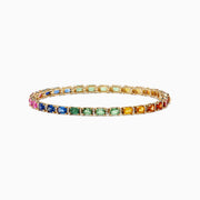 The Watercolors 14K Yellow Gold Multi Sapphire and Diamond Bracelet features rectangular sapphires in a gradient rainbow of pink, blue, green, yellow, and orange for a sparkling, continuous loop on your wrist.
