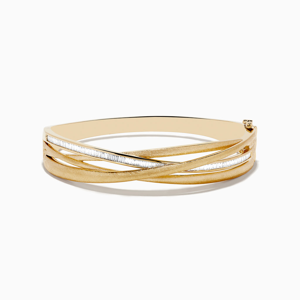 The DOro 14K Brushed Yellow Gold Diamond Crossover Bangle (1.10 TCW) features overlapping polished and textured bands in a crossover design, complete with a subtle side clasp for a refined finish.