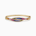 The Watercolors 14K Gold Multi Sapphire and Diamond Bangle, 4.17 TCW, features intertwined rows of sapphires and diamonds in a wave pattern with a side clasp.