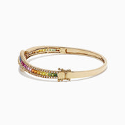 The Watercolors 14K Gold Multi Sapphire and Diamond Bangle, 4.17 TCW, features intertwined rows of sapphires and diamonds in a wave pattern with a side clasp.