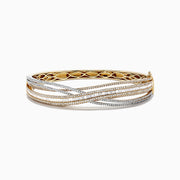 The Duo 14K Two Tone Gold Diamond Crossover Bangle features an intricate overlapping wave design with sparkling diamonds totaling 3.15 TCW, set in both yellow and white gold.