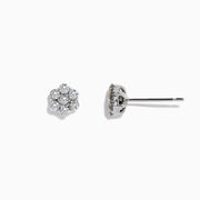 A pair of 14k White Gold Diamond bouquet studs, 0.52 TCW, features multiple round diamonds clustered in a floral design and set closely together in lustrous white gold.