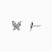 A pair of 14k White Gold Diamond butterfly studs, 0.30 TCW, is displayed on a plain white background.