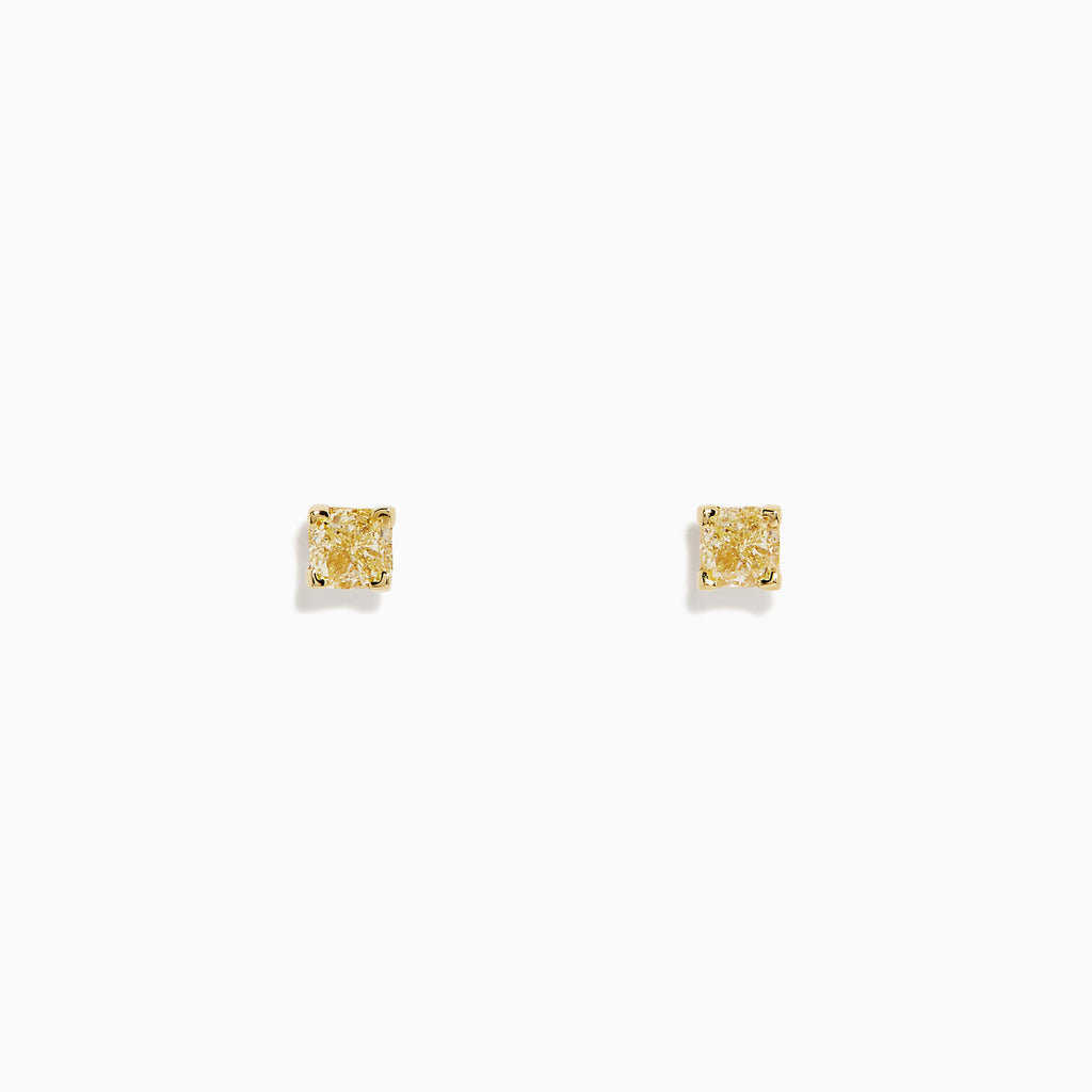 The Canare 18K Yellow Gold Cushion Cut Yellow Diamond Solitaire Stud Earrings (0.66 TCW) feature small, square-shaped yellow diamonds set in yellow gold, shown against a plain white background.