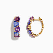 A pair of 14K yellow gold hoop earrings featuring alternating amethyst, tanzanite, and sparkling diamonds, displayed vertically on a white background.