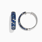 A pair of Effy Splash Silver Blue Sapphire 1 Hoop Earrings, 3.97 TCW, displayed against a white background with soft shadows.