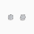 The 14K White Gold Diamond Cluster Stud Earrings, 1.01 TCW, shimmer with radiant facets in a classic prong setting, shown against a plain white background.