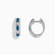 The Bella Bleu 14K White Gold Blue and White Diamond Small Hoop Earrings showcase three marquise-shaped clusters of blue and white diamonds set along the front.