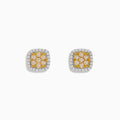The Canare 14K Two Tone Gold Cushion Shaped Cluster Yellow Diamond Earrings feature yellow center stones surrounded by white diamonds, beautifully crafted for a striking look.