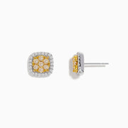 The Canare 14K Two Tone Gold Cushion Shaped Cluster Yellow Diamond Earrings feature yellow center stones surrounded by white diamonds, beautifully crafted for a striking look.