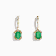 A pair of 14K Yellow Gold Emerald and Diamond Drop Earrings with rectangular emeralds surrounded by white diamonds and additional diamonds on the hooks, shown on a white background.