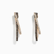 A pair of 14K Rose Gold Espresso and White Diamond Hoop Earrings (0.58 TCW) with intertwined loops—one set with white diamonds, the other with espresso diamonds—offering modern elegance on a white background.