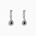 The Royale Bleu 14K Two Tone Gold Sapphire and Diamond Earrings, 0.93 TCW, feature sapphire teardrops encircled by diamonds, set in elegant two-tone gold and shown on a white background.