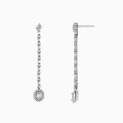 The Classique 14K White Gold Diamond Drop Earrings, 0.72 TCW, feature a linear design of sparkling diamonds ending in an oval-shaped, gem-encrusted drop on each elegant earring.