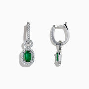 The Brasilica 14K White Gold Emerald and Diamond Drop Earrings, 1.47 TCW, feature rectangular gemstones in an elegant drop design, beautifully displayed on a white background.