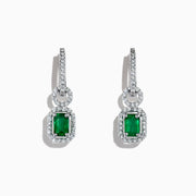 The Brasilica 14K White Gold Emerald and Diamond Drop Earrings, 1.47 TCW, feature rectangular gemstones in an elegant drop design, beautifully displayed on a white background.