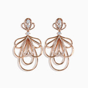 The Pave Rose 14K Gold Diamond Fashion Statement Earrings are elegant pieces crafted in 14K gold, featuring intricate designs and sparkling white diamonds for a stunning look.
