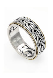 The 925 Sterling Silver and 18K Yellow Gold Mens Band Ring showcases a raised wave pattern and fine gold rope edging, all set against a crisp white background.