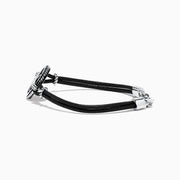 The Mens Sterling Silver Onyx Compass Leather Bracelet, 4.00 TCW, features a black cord with a round sterling silver compass rose charm, silver accents, and a clasp, shown on a white background.