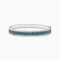 The Bella Bleu 14K White Gold Blue and White Diamond Bangle, 4.47 TCW, features three rows of round blue diamonds in the center, bordered by white diamonds along the edges, showcased on a plain white background.