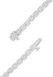 The Bouquet 14K White Gold Diamond Flower Tennis Bracelet features 3.14 TCW of sparkling diamonds in a sleek, continuous floral design.