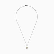 The Canare 18K Two-Tone Gold Oval Yellow Diamond Pendant (0.46 TCW) features a vivid yellow diamond encircled by sparkling stones, blending timeless elegance with modern design.