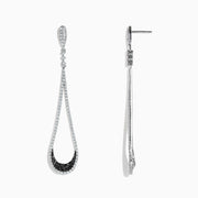 These 14K White Gold Black and White Diamond Drop Earrings (1.70 TCW) feature an open, elegant design with a sleek, sophisticated look, showcased against a white background.