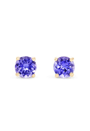 The 14K Yellow Gold Round Tanzanite Stud Earrings feature 0.65 TCW faceted stones in classic four-prong settings, shown against a white background.