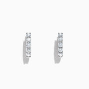 A pair of Pave Classica 14K White Gold 5/8 Diamond Hoop Earrings, 0.98 TCW, shown on a plain white background.