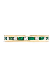 The Brasilica 14K Yellow Gold Emerald and Diamond Channel-Set Ring, 0.66 TCW, showcases alternating rectangular green emeralds and round white diamonds in a slim channel-set single row design.
