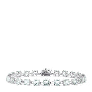 The 14K White Gold Green Amethyst Tennis Bracelet, 13.70 TCW, displays square-cut gemstones in a continuous, elegant line on a white background.