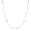 The 14K Yellow Gold Fresh Water Cultured Pearl 18 Necklace features evenly spaced round pearls with subtle variations, creating a simple, elegant look. Pearls are set on a delicate yellow gold chain and displayed against a plain white background.
