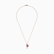 The Safari 14K Rose Gold Ruby and Diamond Flamingo Pendant (0.64 TCW) features an elegant flamingo standing on one leg with ruby, white, and black stones highlighting its body, wing, and eye.