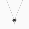 A Novelty 14K Gold Palm Tree Pendant with 0.27 TCW black and white diamonds, displayed on a fine chain against a white background.