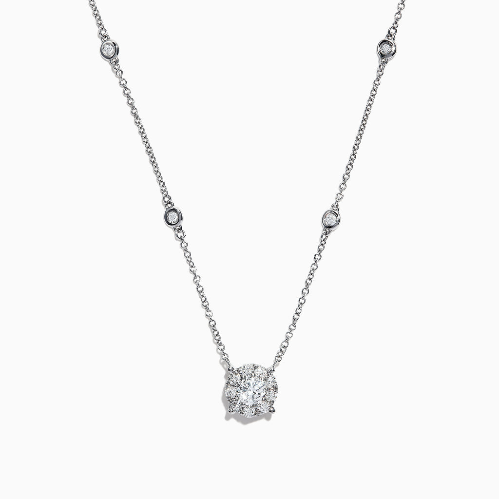 The Bouquet 14K White Gold Diamond Station Cluster Pendant Necklace, 0.82 TCW, showcases a large round diamond pendant and four bezel-set diamonds along the chain, beautifully displayed on a white background.