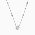 The Bouquet 14K White Gold Diamond Station Cluster Pendant Necklace, 0.82 TCW, showcases a large round diamond pendant and four bezel-set diamonds along the chain, beautifully displayed on a white background.