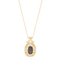 14K yellow gold necklace with an ornate pendant featuring espresso and white diamonds (0.29 TCW) in an intricate design, hanging from a delicate gold chain.
