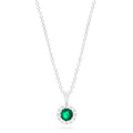 The Brasilica 14K White Gold Emerald and Diamond Pendant features a round emerald with a halo of diamonds (0.41 TCW), suspended from a delicate white gold chain.