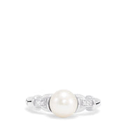 The 925 Sterling Silver Cultured Pearl and Diamond Ring (0.03 TCW) features a round pearl at the center with two small square-set diamonds on each side, displayed against a plain white background.