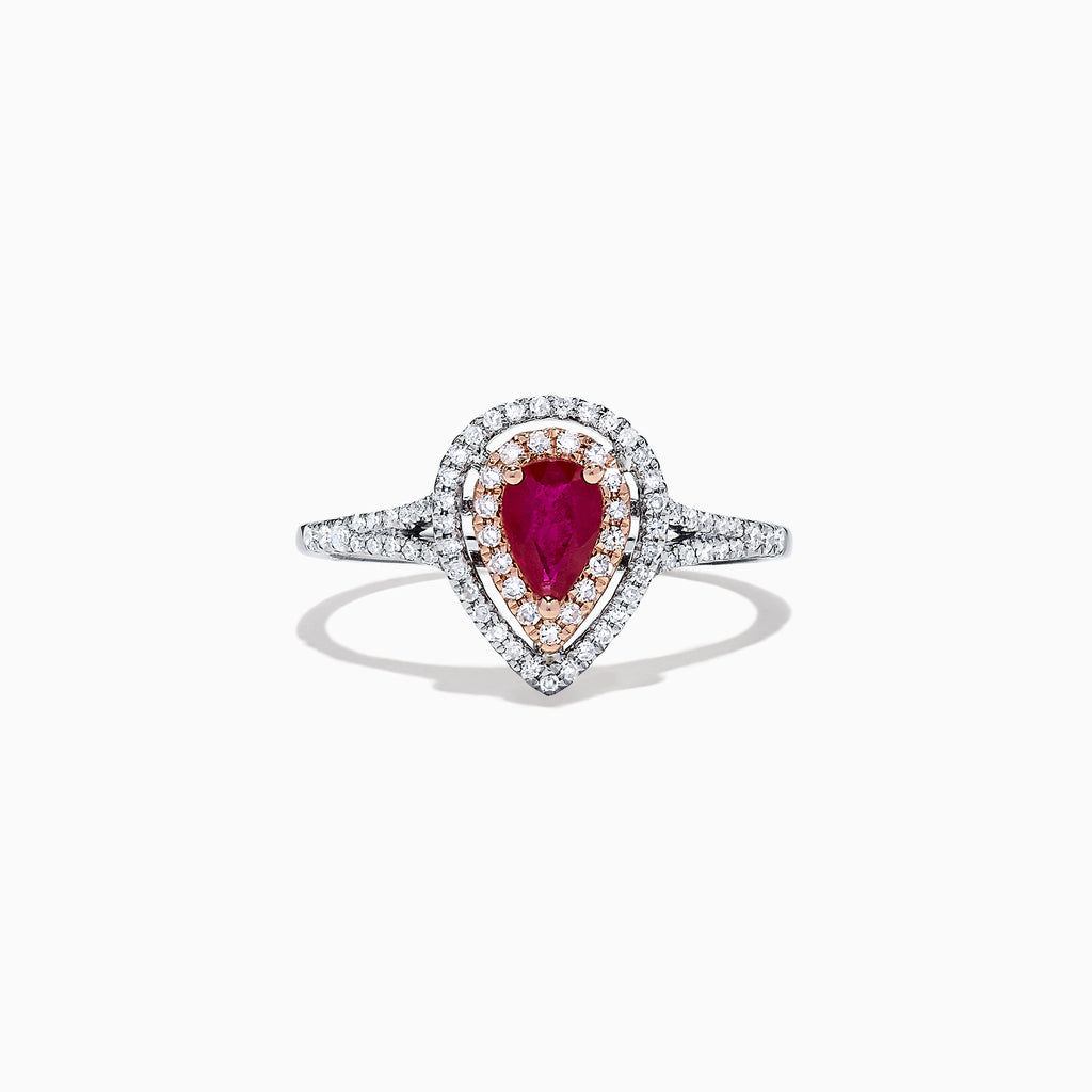 The Ruby Royale 14K Two Tone Gold Ring features a pear-shaped ruby at the center, surrounded by two halos of sparkling diamonds (0.77 TCW), elegantly set and displayed on a plain white background.
