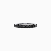 The 14K White Gold Black Diamond Stack Ring, 0.65 TCW, features small round black diamonds encircling the band and is shown against a white background.