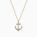 The Seaside 14K Yellow Gold Diamond Anchor Pendant (0.21 TCW) features sparkling diamonds and gold detailing at the tips and crossbar, creating a radiant anchor design against a plain white background.