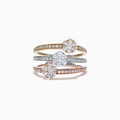 The Trio 14K Tri Tone Gold Split Band Diamond Flower Ring, 1.04 TCW, features stacked bands of gold set with round center diamonds and sparkling accents, creating a dazzling diamond flower effect.