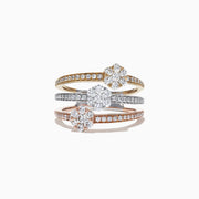 The Trio 14K Tri Tone Gold Split Band Diamond Flower Ring, 1.04 TCW, features stacked bands of gold set with round center diamonds and sparkling accents, creating a dazzling diamond flower effect.