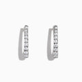 A pair of Pave Classica 14K White Gold 3/4 Diamond Hoop Earrings, 0.49 TCW, displayed upright against a plain white background with soft shadows.