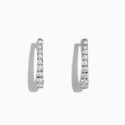 A pair of Pave Classica 14K White Gold 3/4 Diamond Hoop Earrings, 0.49 TCW, displayed upright against a plain white background with soft shadows.