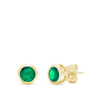 A pair of Brasilica 14K Yellow Gold Emerald Stud Earrings, 0.95 TCW, with round studs set in yellow gold bezels, displayed against a white background.